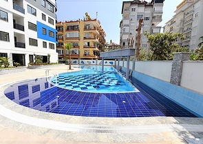 في المركز قريبة من الخدمات - شقة 1+1 - ضمن مجمع سكني فاخر / في مركز الانيا 