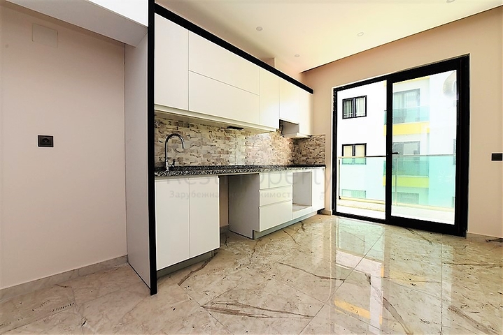 مجمع فاخر - شقق 2 غرفة وصالة - مطبخ منفصل -في مركز الانيا 