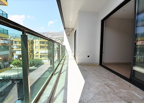 مجمع فاخر - شقق 2 غرفة وصالة - مطبخ منفصل -في مركز الانيا 