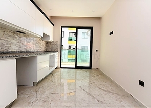 مجمع فاخر - شقق 2 غرفة وصالة - مطبخ منفصل -في مركز الانيا 