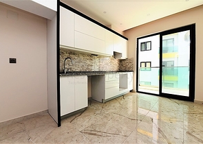 مجمع فاخر - شقق 2 غرفة وصالة - مطبخ منفصل -في مركز الانيا 