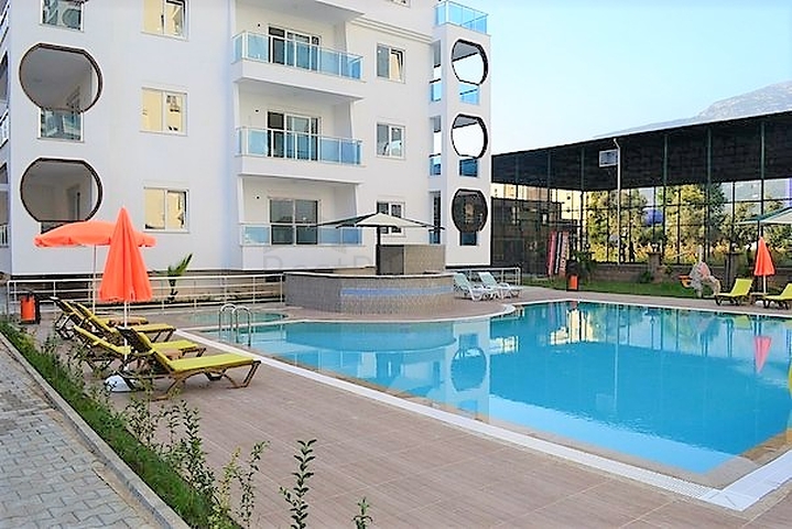 مجمع يضم كافة الخدمات -قريب من البحر - شقة مفروشة 1+1- في مهموتلار / الانيا 