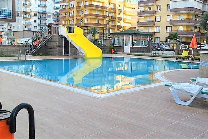 مجمع يضم كافة الخدمات -قريب من البحر - شقة مفروشة 1+1- في مهموتلار / الانيا 