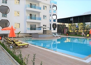 مجمع يضم كافة الخدمات -قريب من البحر - شقة مفروشة 1+1- في مهموتلار / الانيا 