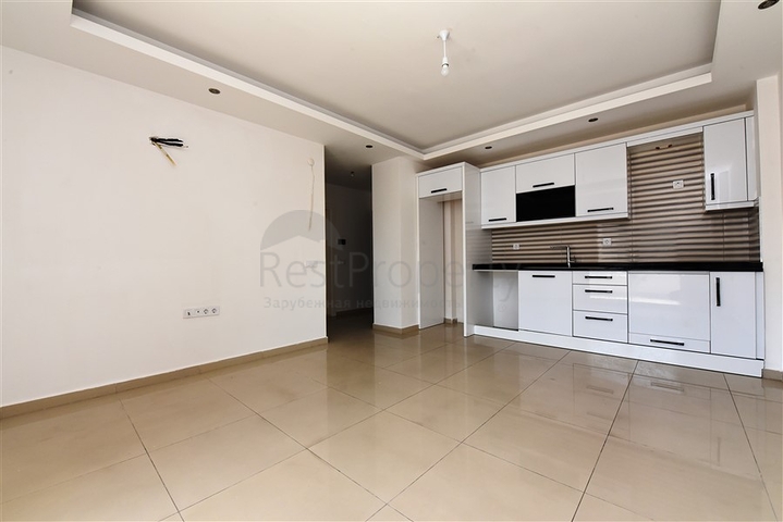 شقة غرفة وصالة - في منطقة مركزية - وضمن مجمع يضم كافة الخدمات - جيكجلي / الانيا 