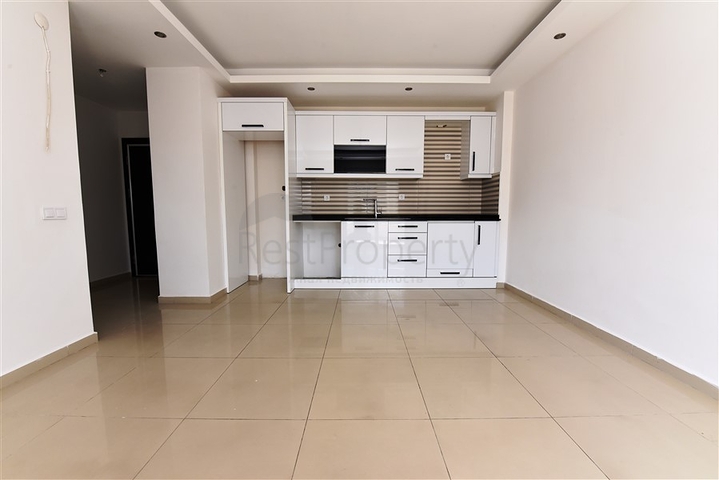 شقة غرفة وصالة - في منطقة مركزية - وضمن مجمع يضم كافة الخدمات - جيكجلي / الانيا 