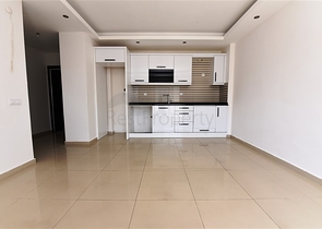 شقة غرفة وصالة - في منطقة مركزية - وضمن مجمع يضم كافة الخدمات - جيكجلي / الانيا 