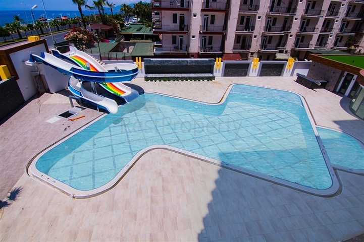 دوبلكس باطلالة بحرية مباشرة - 4 غرف وصالة - ضمن مجمع سكني - في مهموتلار / الانيا 