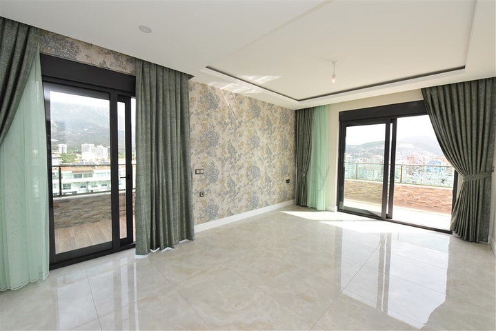 دوبلكس باطلالة بحرية مباشرة - 4 غرف وصالة - ضمن مجمع سكني - في مهموتلار / الانيا 