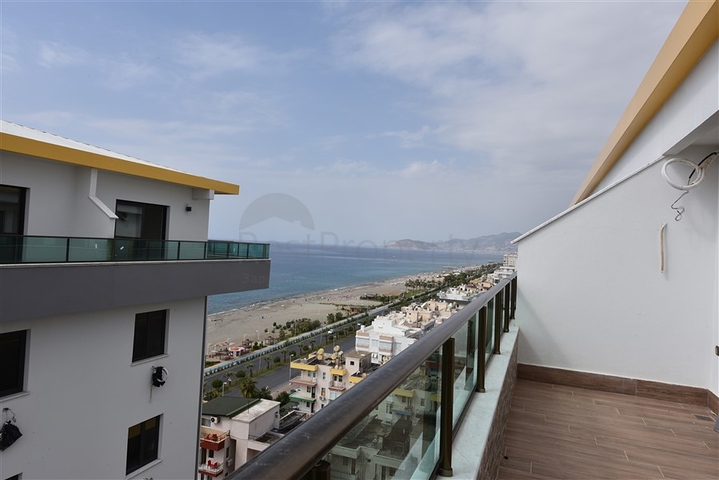 دوبلكس باطلالة بحرية مباشرة - 4 غرف وصالة - ضمن مجمع سكني - في مهموتلار / الانيا 