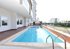 شقة جديدة وبسعر مناسب - غرفة وصالة مفروشة - في مهموتلار / الانيا 