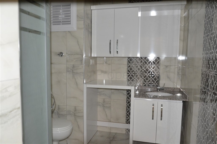 شقة غرفة وصالة - ضمن مجمع حديث - يضم كافة الخدمات - في منطقة مهموتلار / الانيا 