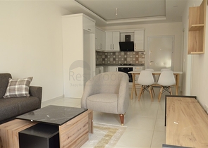 شقة غرفة وصالة - ضمن مجمع حديث - يضم كافة الخدمات - في منطقة مهموتلار / الانيا 