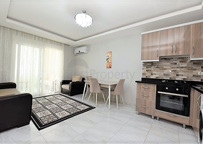 شقة مؤثثة - غرفة وصالة ضمن مجمع - مهموتلار / الانيا 