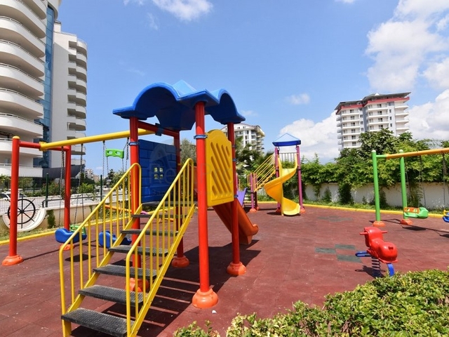 اطلالة على المسبح - شقة 2 غرفة وصالة - ضمن مجمع يضم كافة الخدمات - مهموتلار / الانيا 