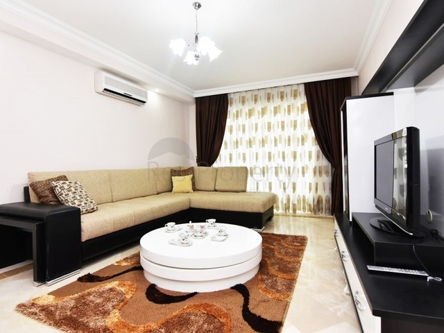 اطلالة على المسبح - شقة 2 غرفة وصالة - ضمن مجمع يضم كافة الخدمات - مهموتلار / الانيا 