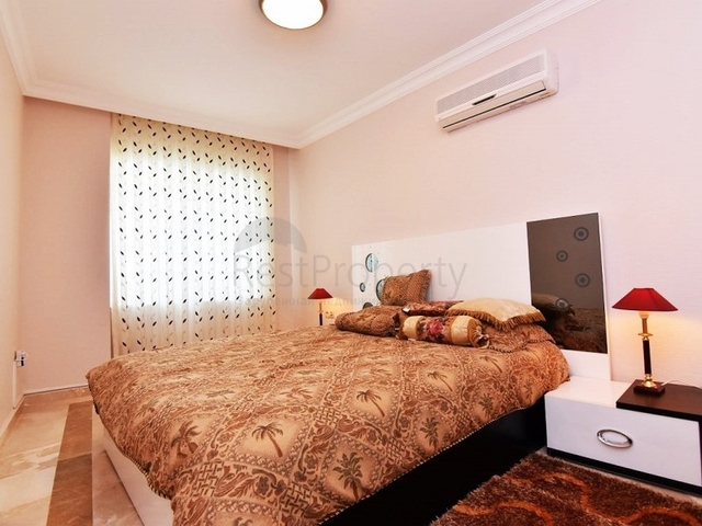 اطلالة على المسبح - شقة 2 غرفة وصالة - ضمن مجمع يضم كافة الخدمات - مهموتلار / الانيا 