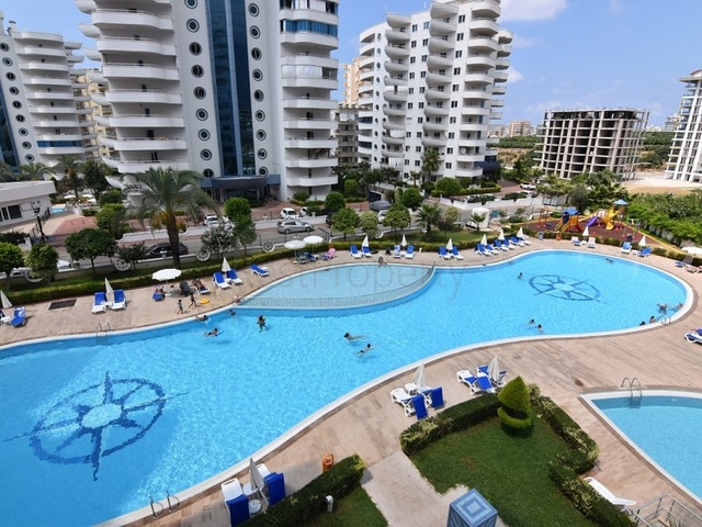 اطلالة على المسبح - شقة 2 غرفة وصالة - ضمن مجمع يضم كافة الخدمات - مهموتلار / الانيا 