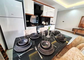 شقة جديدة بسعر منافس - غرفتين وصالة -مع الفرش- في مهموتلار / الانيا 