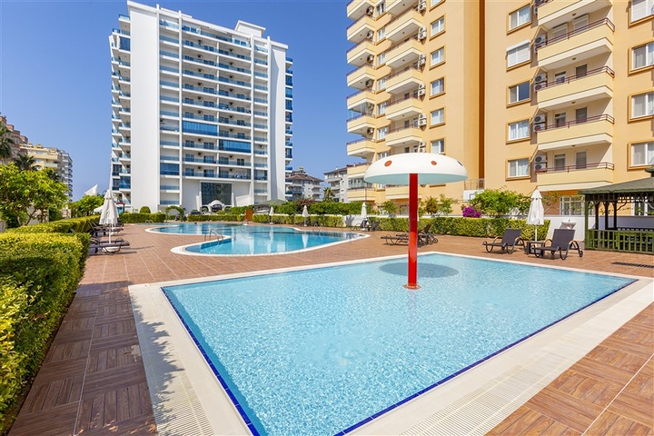 اطلالة بحر - شقة ضمن مجمع فاخر - تصميم 1+1 - في مهموتلار / الانيا 