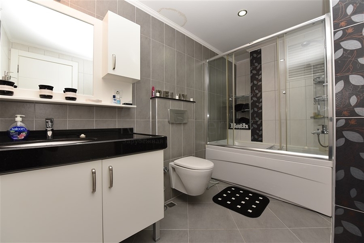 شقة اطلالة بحرية في الانيا -تصميم 2 غرفة وصالة - مفروشة - في منطقة مهوتلار / الانيا 