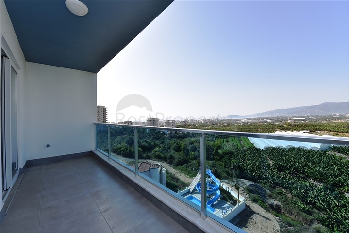 دوبلكس اطلالة بحر وجبل - 2 غرفة وصالة - مجمع سكني حديث - مهموتلار / الانيا 