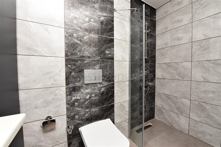 دوبلكس اطلالة بحر وجبل - 2 غرفة وصالة - مجمع سكني حديث - مهموتلار / الانيا 