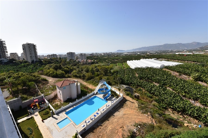 دوبلكس اطلالة بحر وجبل - 2 غرفة وصالة - مجمع سكني حديث - مهموتلار / الانيا 