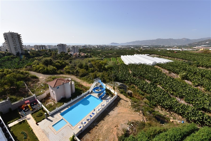 دوبلكس اطلالة بحر وجبل - 2 غرفة وصالة - مجمع سكني حديث - مهموتلار / الانيا 