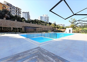 بين احضان الطبيعة - وقريب من الخدمات - مجمع جديد - شقق من تصميم 2 غرفة وصالة - في توسمور / الانيا 