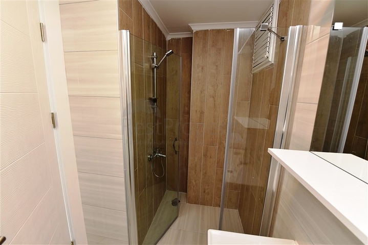 طابق مرتفع - مجمع سكني حديث - شقة 1+1 غرفة نوم وصالة - في مهموتلار / الانيا 