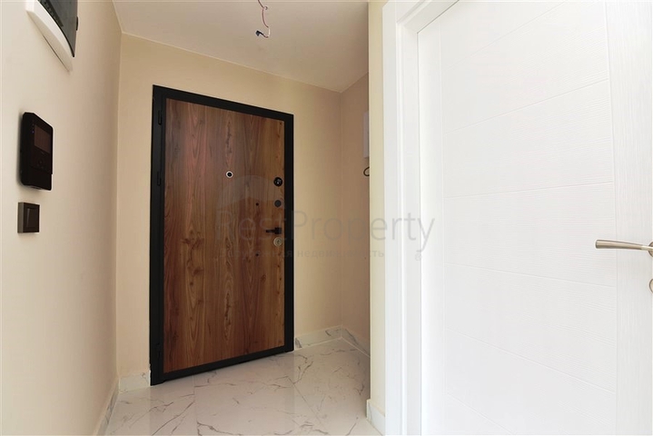 طابق مرتفع - مجمع سكني حديث - شقة 1+1 غرفة نوم وصالة - في مهموتلار / الانيا 