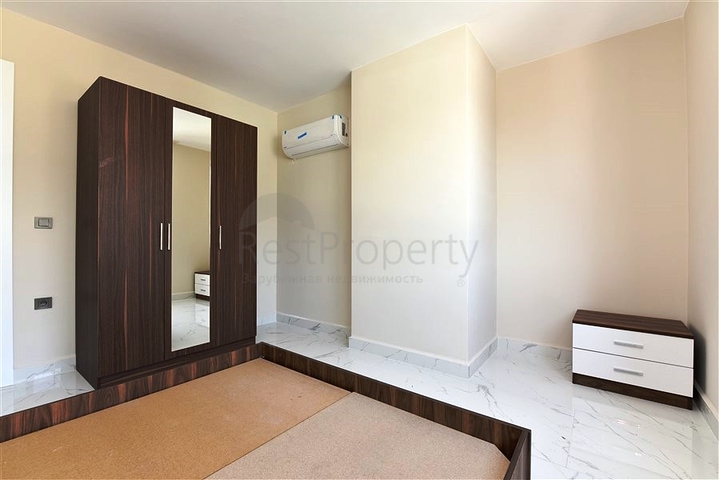 طابق مرتفع - مجمع سكني حديث - شقة 1+1 غرفة نوم وصالة - في مهموتلار / الانيا 