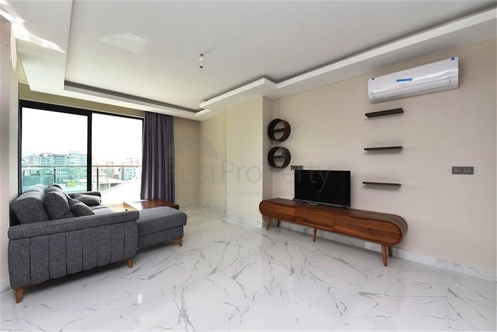 طابق مرتفع - مجمع سكني حديث - شقة 1+1 غرفة نوم وصالة - في مهموتلار / الانيا 