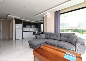 طابق مرتفع - مجمع سكني حديث - شقة 1+1 غرفة نوم وصالة - في مهموتلار / الانيا 