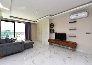 طابق مرتفع - مجمع سكني حديث - شقة 1+1 غرفة نوم وصالة - في مهموتلار / الانيا 