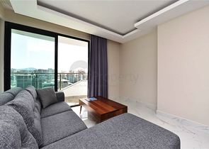 طابق مرتفع - مجمع سكني حديث - شقة 1+1 غرفة نوم وصالة - في مهموتلار / الانيا 