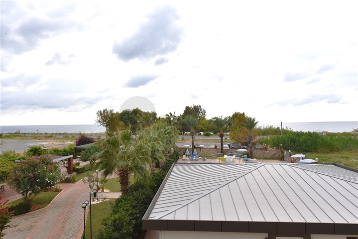 على البحر مباشرة - شقق عائلية 2 غرفة وصالة -في مدينة الانيا / منطقة ديمرتاش 