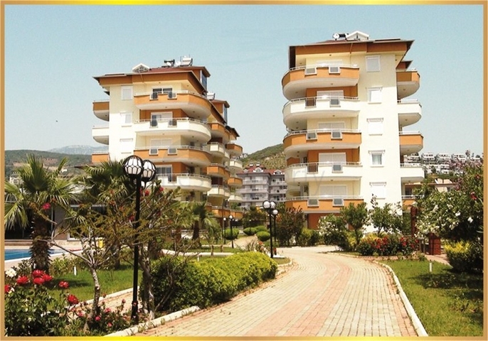 على البحر مباشرة - شقق عائلية 2 غرفة وصالة -في مدينة الانيا / منطقة ديمرتاش 