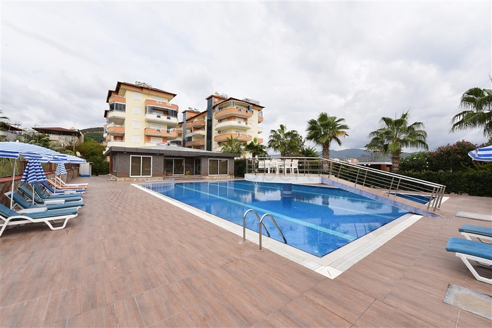 على البحر مباشرة - شقق عائلية 2 غرفة وصالة -في مدينة الانيا / منطقة ديمرتاش 