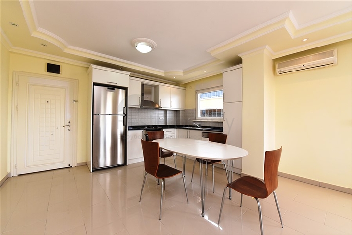 على البحر مباشرة - شقق عائلية 2 غرفة وصالة -في مدينة الانيا / منطقة ديمرتاش 