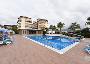 على البحر مباشرة - شقق عائلية 2 غرفة وصالة -في مدينة الانيا / منطقة ديمرتاش 