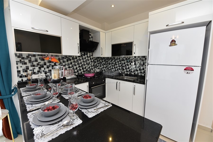 تصميم انيق - شقة مؤثثة - غرفة وصالة - قريبة من البحر - في مهموتلار  / الانيا 