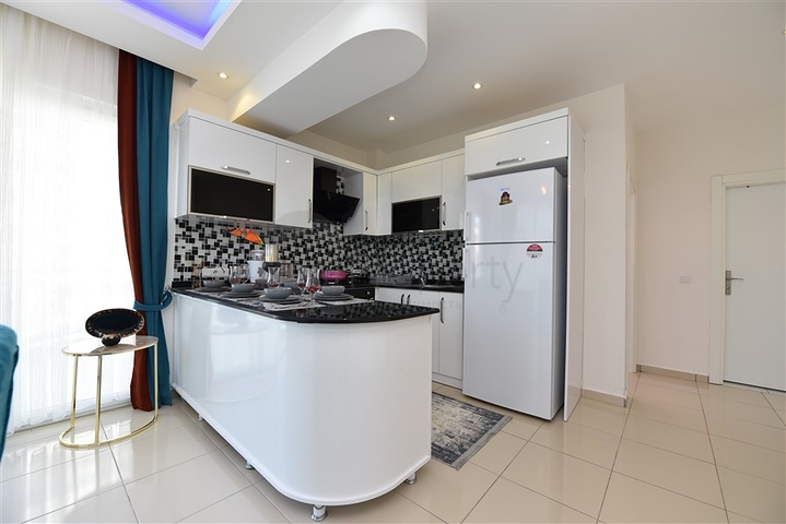 تصميم انيق - شقة مؤثثة - غرفة وصالة - قريبة من البحر - في مهموتلار  / الانيا 