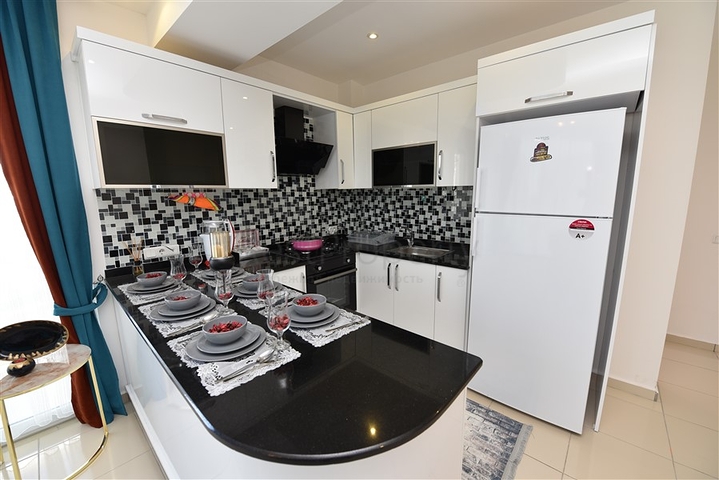 تصميم انيق - شقة مؤثثة - غرفة وصالة - قريبة من البحر - في مهموتلار  / الانيا 