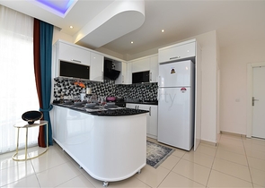 تصميم انيق - شقة مؤثثة - غرفة وصالة - قريبة من البحر - في مهموتلار  / الانيا 