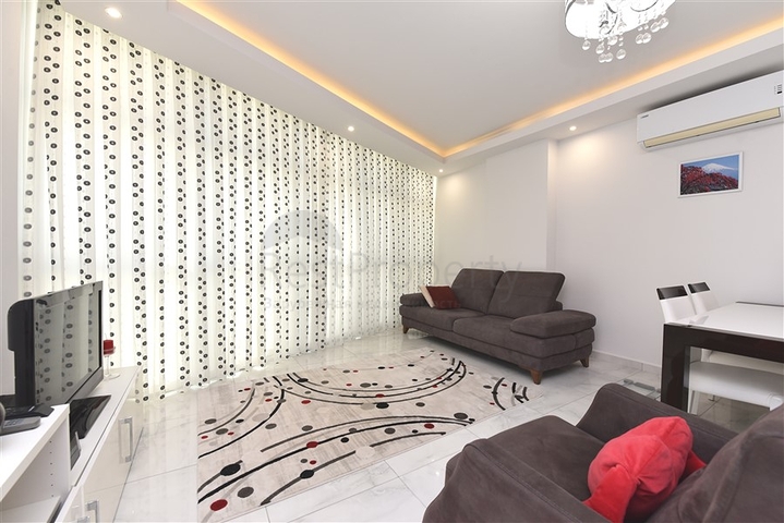 ضمن مجمع فاخر - شقة غرفة وصالة مؤثثة - قريبة من البحر - في مهموتلار / الانيا 