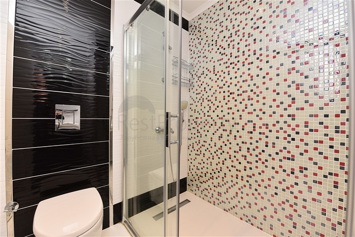 ضمن مجمع فاخر - شقة غرفة وصالة مؤثثة - قريبة من البحر - في مهموتلار / الانيا 