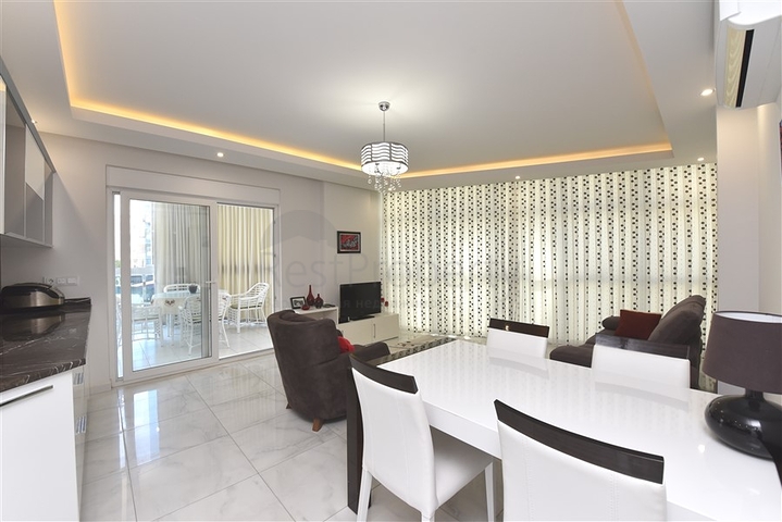 ضمن مجمع فاخر - شقة غرفة وصالة مؤثثة - قريبة من البحر - في مهموتلار / الانيا 