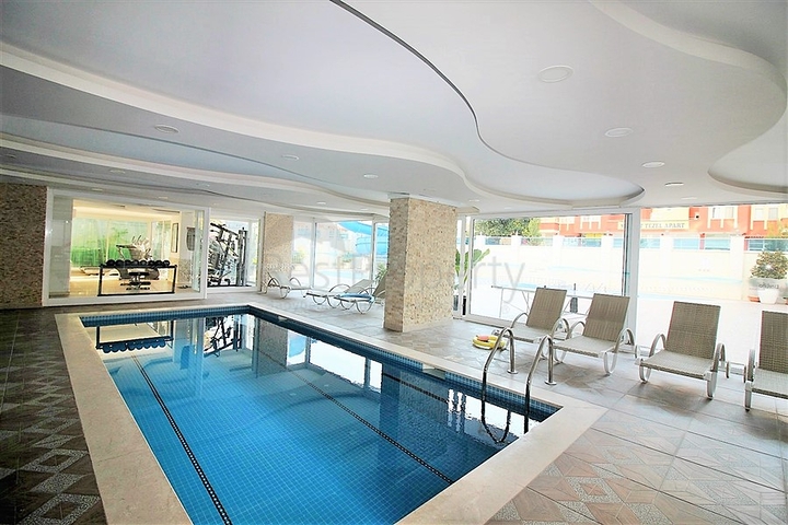 ضمن مجمع فاخر - شقة غرفة وصالة مؤثثة - قريبة من البحر - في مهموتلار / الانيا 